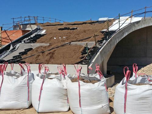 Substrat is being applied on a pitched green roof